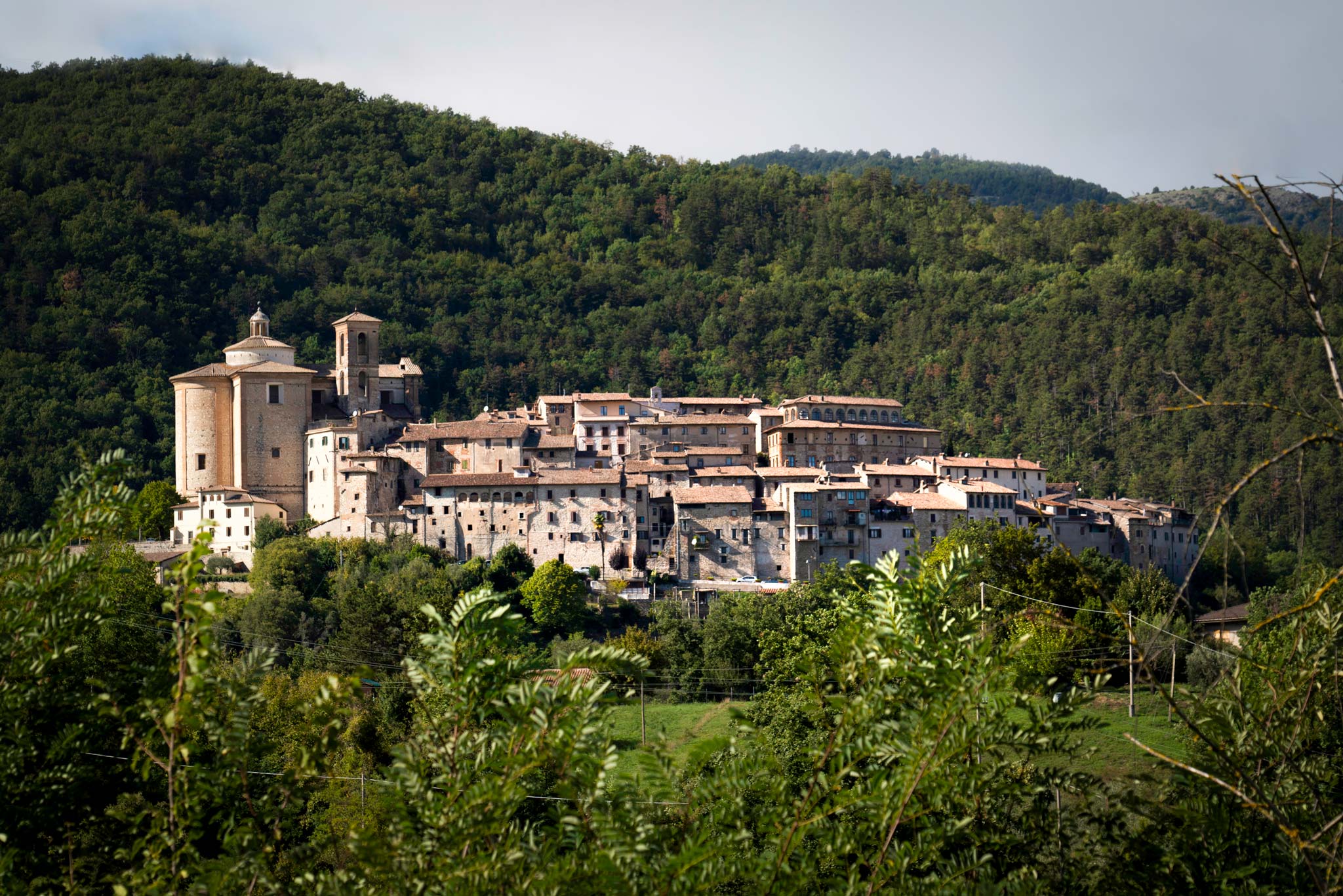 The borgo of Contigliano clings to the hill, creating a delightful village near Rome to visit