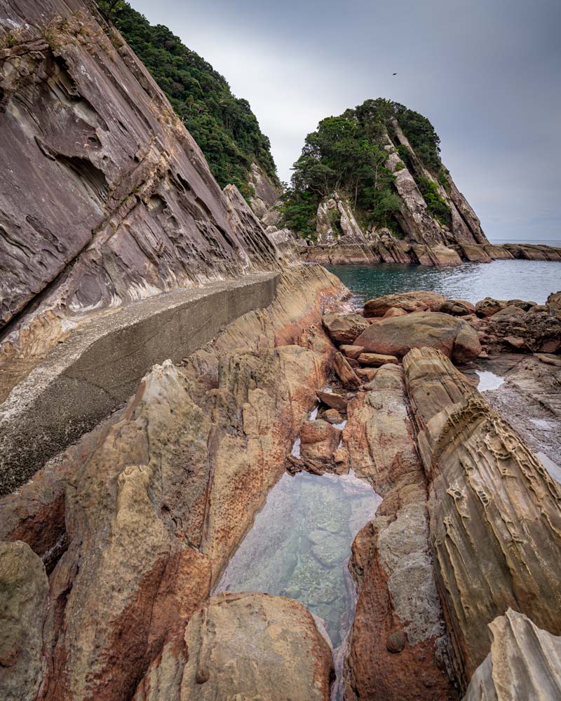 The dramatic rocky coastline made through thousands of years of activity