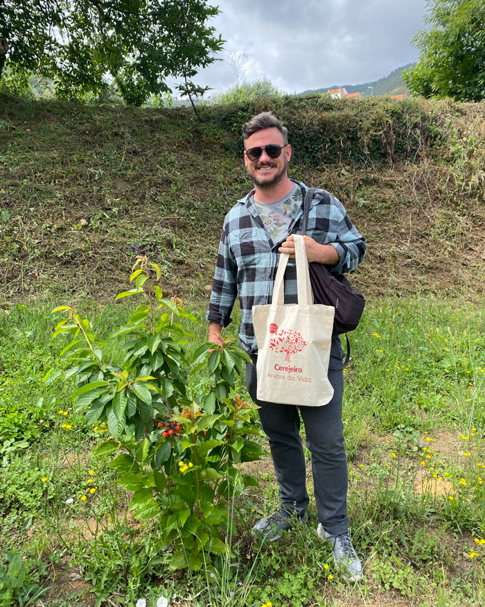 Proudly standing next to my very own Fundão cherry tree