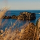 A viewing platform on the rocky Sado Island coast