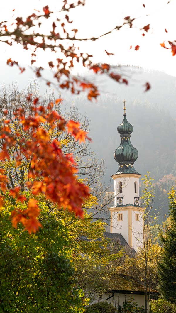 A pretty church tower in Lake Wolfegang