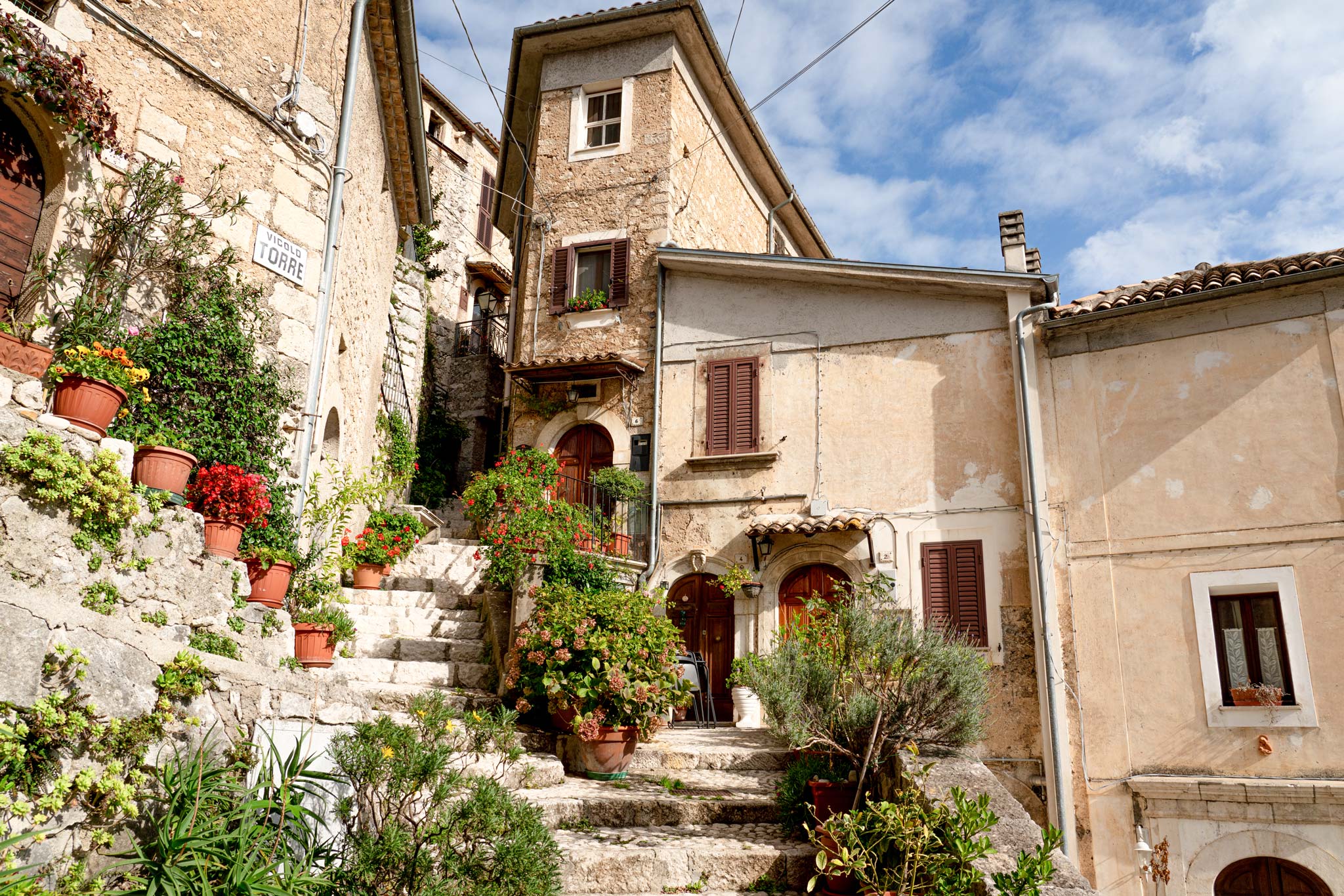 Colourful corners and flower pots on the streets of San Donato Val di Comino