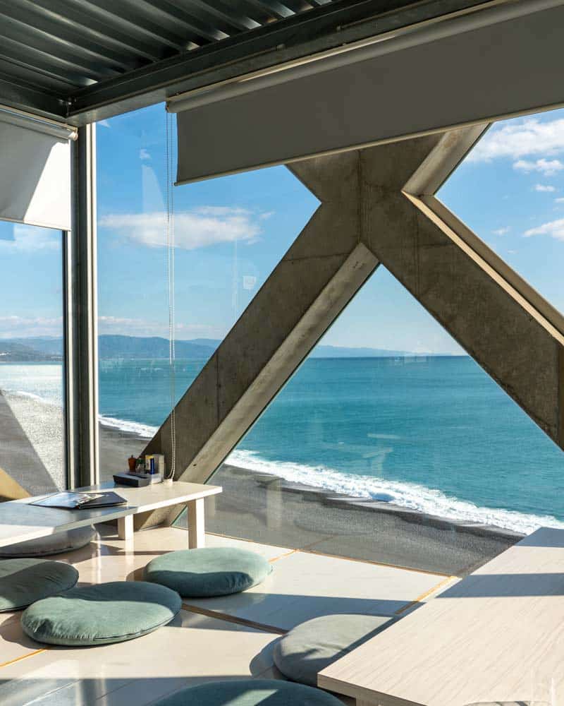 Sea house is a glass restaurant looking out on the ocean